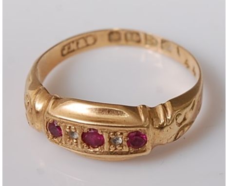 A vintage 18ct gold, ruby and diamond point set ring, 2g, size M