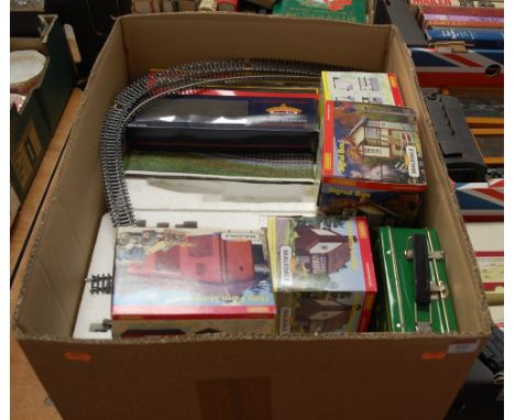 A collection of Hornby and Bachmann 00 gauge model railway locomotives, track and scenery