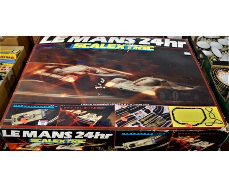 A collection of childrens toys, to include a Scalextric Le Mans 24 hour set, spare Scalextric track and cars, and a Picoo Mod