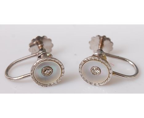 A pair of circa 1930s 9ct white gold, mother of pearl and diamond point set ear clips, in fitted case