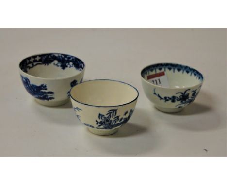 An 18th century Worcester blue and white tea bowl, decorated with various Oriental figures within landscape; together with tw