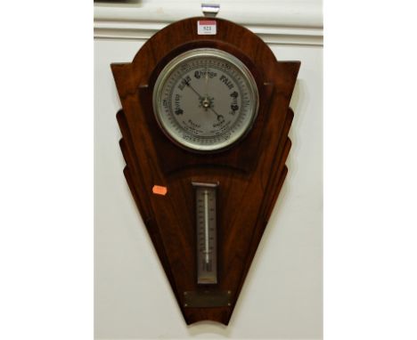 An Art Deco oak cased wall hanging two dial barometer/thermometer with presentation plaque dated 1938, 59cm