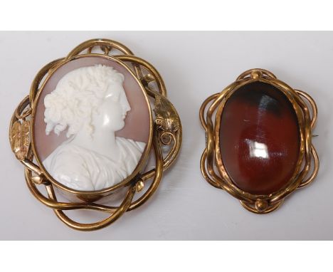 A carved shell cameo portrait brooch, depicting a profile of a maiden, 4 x 3.2cm, in pinchbeck mount; together with a polishe