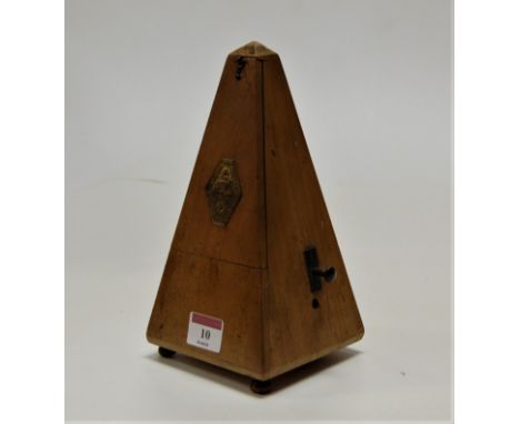 A mid 20th century French walnut cased metronome, height 22cm