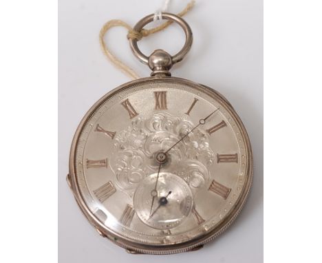 A late 19th century continental silver cased gent's open faced pocket watch, the unsigned and engraved silvered dial having s