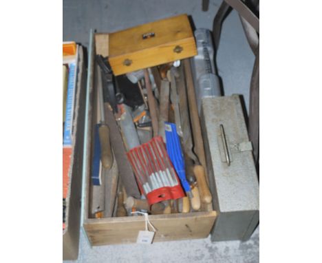 A collection of tools, including: files; hand tools; electric driver; etc.
