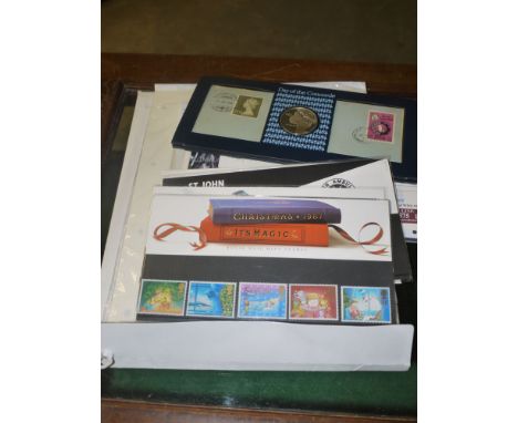 A collection of stamps and first day covers, including: The Day of the Concord commemorative issue.