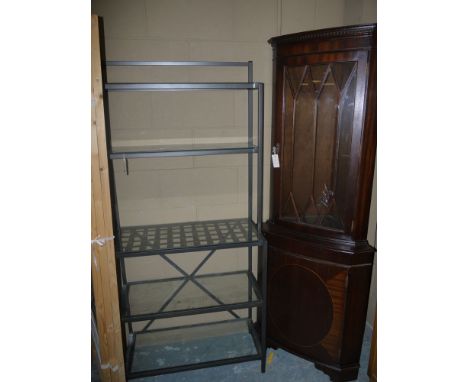 A reproduction mahogany corner display cupboard; a metal five-tier shelf unit with glass shelves; and a folding wardrobe.