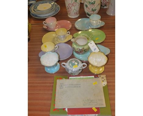 A collection of Maling ware, including: two sundae dishes; a florally decorated jug; sundae cups and saucers; a sugar bowl an