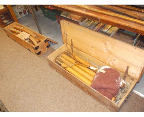 An Association Badminton set, by John Jaques & Son; together with a 'Tenikoit' or ring tennis game, in wooden box.
