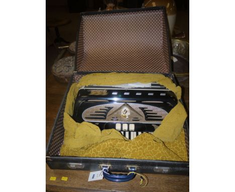 A 20th Century piano accordion by Galanti, in fitted case.