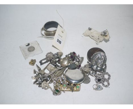 A silver bangle; napkin ring; a cold painted metal dog; and sundries