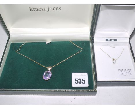 A rectangular facet cut amethyst pendant in yellow metal mount, stamped '9ct.', on fancy twist chain; together with a heart-s