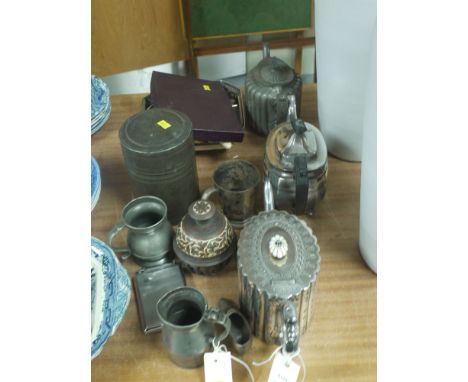 A Benares brass container with pewter interior (tobacco storage); a chromed metal cigarette case and lighter combined; three 