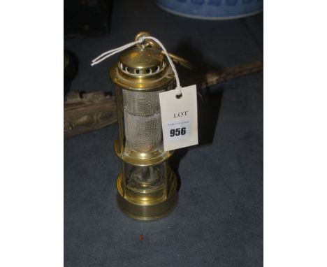 A 19th Century "Clanny" "Official's" mining lamp in brass, with circular top, with pierced vent holes, supported by three bra