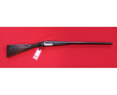 A 12 bore S/S B.L.N.E. by John Wilkes, S/No.9032, this item can only be purchased by someone with a current valid shotgun cer