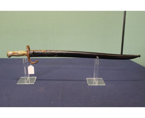 A French 1866 model brass hilted bayonet with scabbard