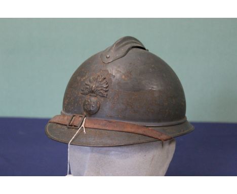 A French model 15 Adrian helmet with R F badge