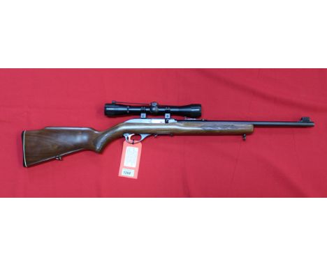 A Marlin model 995 .22 L.R. S/A rifle complete with Bisley 4x32 scope and three magazines, in excellent condition throughout,