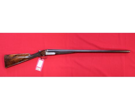 A 12 bore side by side shotgun by Greener, S/No.20742 with 30" barrels, this item can only be purchased by someone with a cur