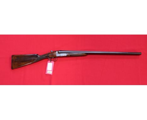 A 12 bore side-by-side shotgun by A.Y.A. with 28" barrels, S/No.535305, a very good clean example with fine bores, this item 