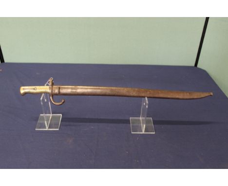 A French model 1866 brass hilted bayonet with scabbard
