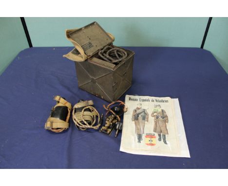 A cased 'morse' light with three keys and seven uncut Spanish Civil War ration coupons, all with different military images