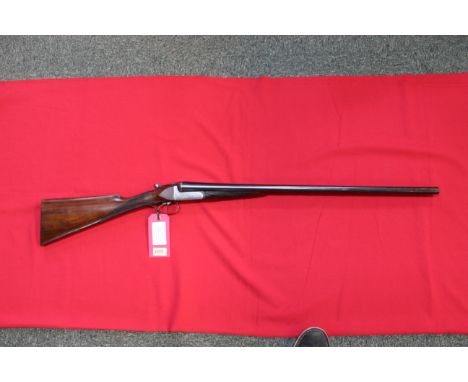 A 12 bore side-by-side shotgun by W R Pape with 28" barrels, this classic shotgun is a B.L.E., in overall good condition with