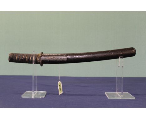 A Japanese Tanto with signed tang and approx 13" blade, scabbard has pocket with small knife (Kozuka) present, a very fine it