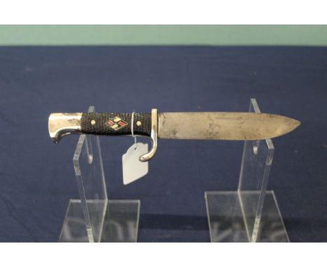 A Third Reich era Hitler youth knife with correct scabbard and belt loop (N.B. blade has been ground clean with Student Leagu
