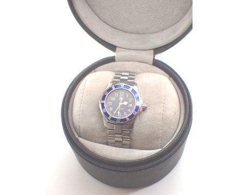 Ladies Tag sports watch with stainless strap and box  CONDITION REPORT: Watch is ticking at lotting, seconds hand moving and 