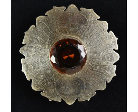 * The Cameronians. A Victorian Scottish Pipe-Major's plaid brooch of The Scottish Rifles, the shaped white metal badge finely