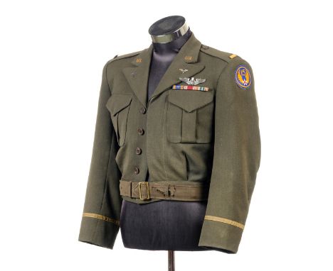 * United States Army Air Force. A USAAF Officer's Ike blouse, worn by a Bombardier, wings badge stamped 'Sterling', brass and