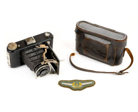 * Imperial Japanese Army Air Force. A WWII period Victory camera in a brown leather case plus a pair of cloth embroidered pil