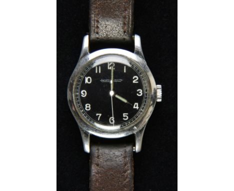 * Military Wristwatch. A WWII Jaeger Le Coutre military wristwatch, the 28mm circular black dial with lume hands and Arabic n