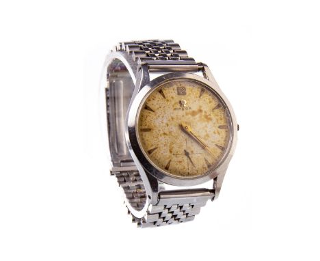 GENTLEMAN'S OMEGA STAINLESS STEEL MANUAL WIND WRIST WATCH, early 1950s, the round dial with applied arrowhead hour markers, s