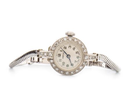 LADY'S VERTEX MANUAL WIND DIAMOND SET COCKTAIL WATCH, signed Vertex Revue 15 Jewel movement, the round dial with Arabic numer