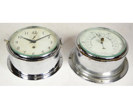 A 1930s Smiths Empire chrome plated cased wall clock, together with a chrome plated wall hanging aneroid barometer, 18cm diam