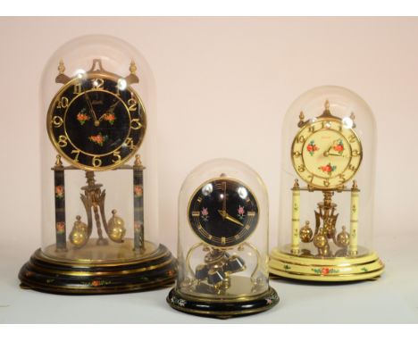 Two mid 20th century Kundo anniversary clocks, together with a smaller Schatz anniversary clock (3)