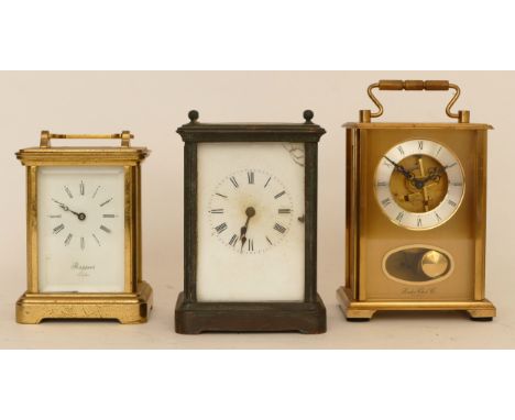 A 20th century Rapport brass corniche cased striking carriage clock, 15cm high together with a 20th century hourly striking c