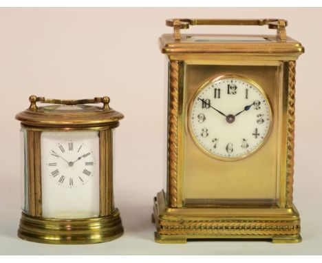 A 20th century French brass corniche cased carriage clock, 14cm high together with a miniature cylindrical brass corniche cas