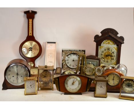 A collection of mid 20th century and later mantel clocks and barometers, having manual wind and quartz movements. (3)