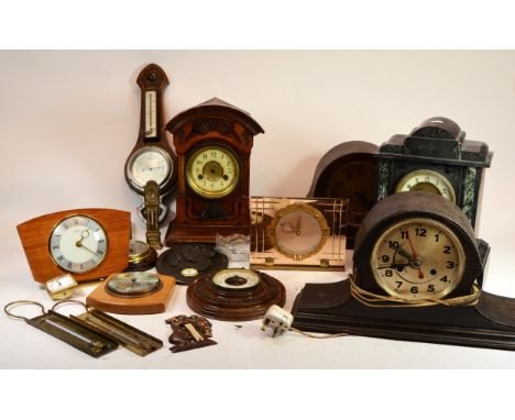 A collection of mid 20th century and later mantel clocks and barometers, having manual wind and quartz movements. (2)