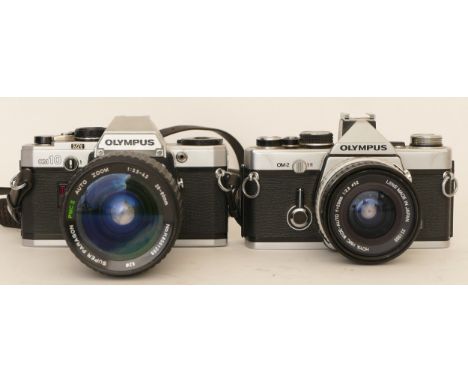 An Olympus OM10 camera with a Super Paragon PMCII 1:3.5-4.5 28-80mm lens and an Olympus OM-2 with a Hoya HMC f=28mm 1:2.8 len