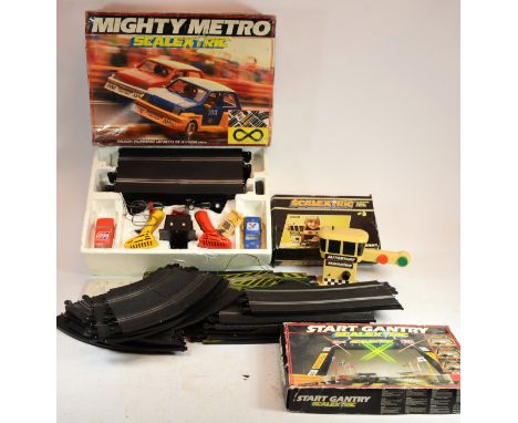 A collection of Scalextric model motor racing parts, to include track, cars and accessories (3)