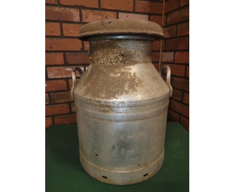 A 20th century galvanized metal twin handled milk churn, 48cm high.