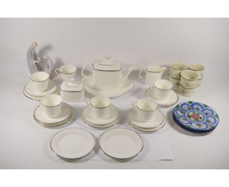 Three boxes of ceramics to include a Royal Doulton Platinum Concord tea service, H 5048, Stanley China and others. (3)