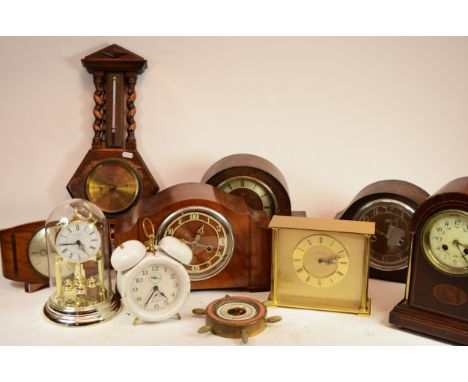 Two boxes of mid 20th century clocks to include mantle clocks, alarm clocks and an anniversary clock together with an oak cas
