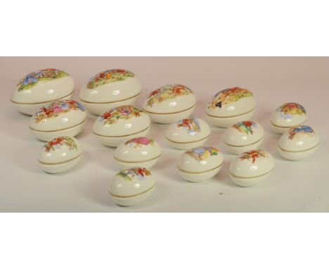 Royal Doulton Bunnykins; fifteen egg shaped lidded trinket boxes with differing designs. All in fine condition - showing no d