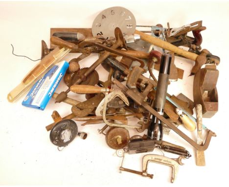 A collection of early 20th century and later carpenters hand tools, to include box planes, Stanley planes, drills, saws, torc